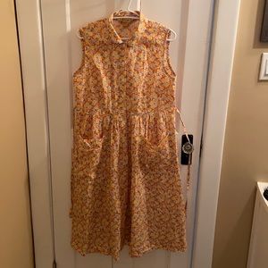 Floral sleeveless button down dress